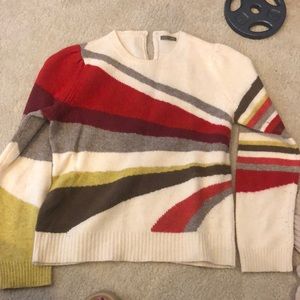 Jcrew Wools sweater with cute sleeve detail and fun strips that swirl around